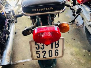 Honda Cub 50 cc học sinh đi