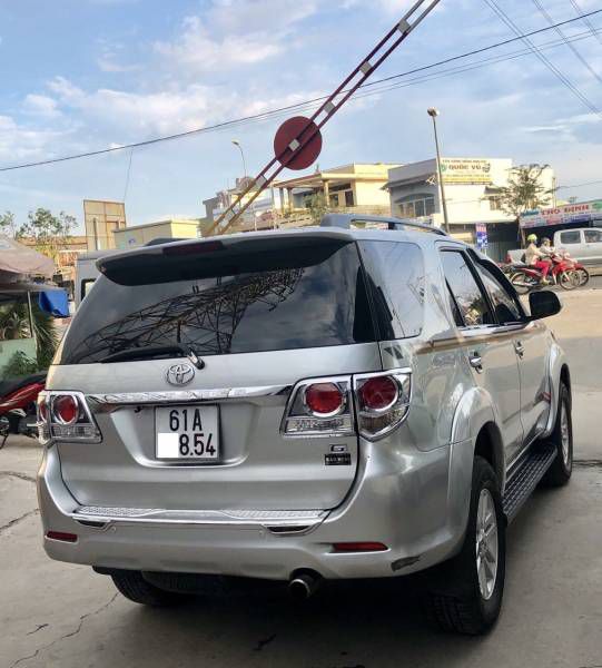 Ban Toyota Fortuner 2.5G 2014, so san, may dau, len full do choi, bao hanh hang